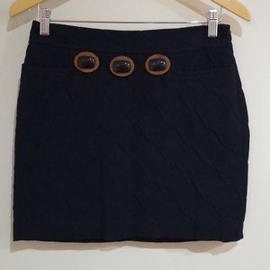 A4 Milly 4 textured diamond pattern navy mini skirt